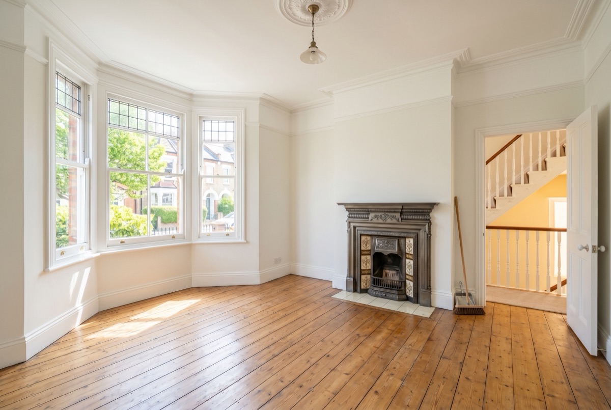 A cleared and swept empty living room after a Gibbs house clearance
